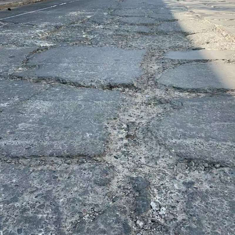 婺城路面起砂露石子修补料